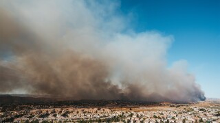 California wildfire burns near a residential area.jpg