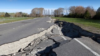 road damaged by earthquake getty.jpg
