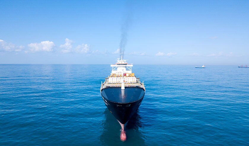 Low angle aerial image of a container ship at sea.jpg