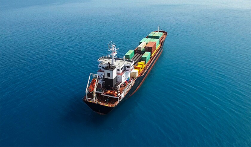 Cargo ship in sea stock image .jpg