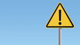 Yellow black warning sign with exclamation mark icon with blue background vector illustration