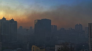 Kyiv city Ukraine in smoke.png