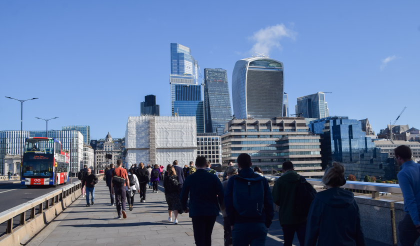 London Bridge and City of London People walk along London Bridge past The Shard.png
