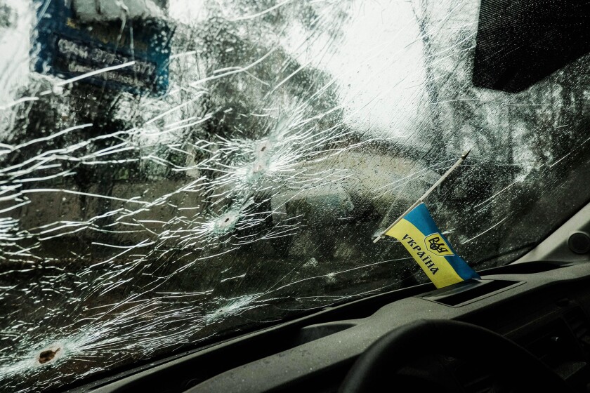 A bullet riddled the windshield of a civilian car in Bucha, Ukraine following heavy fighting between Russian and Ukrainian forces. As Russian troops withdraw from areas north of Ukraine's capital city of Kyiv Ukrainian officials call the heavy civilian ca