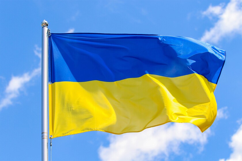 Flag of Ukraine on a background of blue sky.jpg