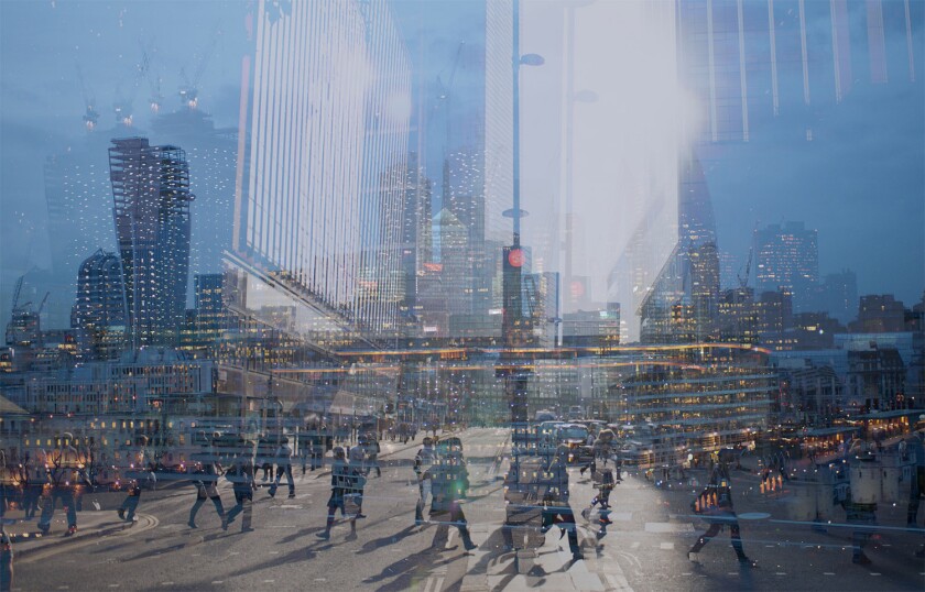 Multiple exposure of city commuters and skyscrapers in London.jpg