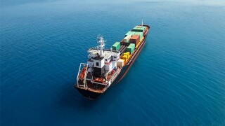 Cargo ship in sea stock image .jpg