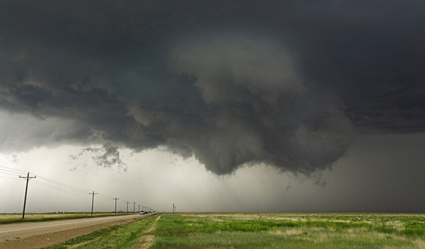 Severe thunderstorm lowering cloud threatens tornado