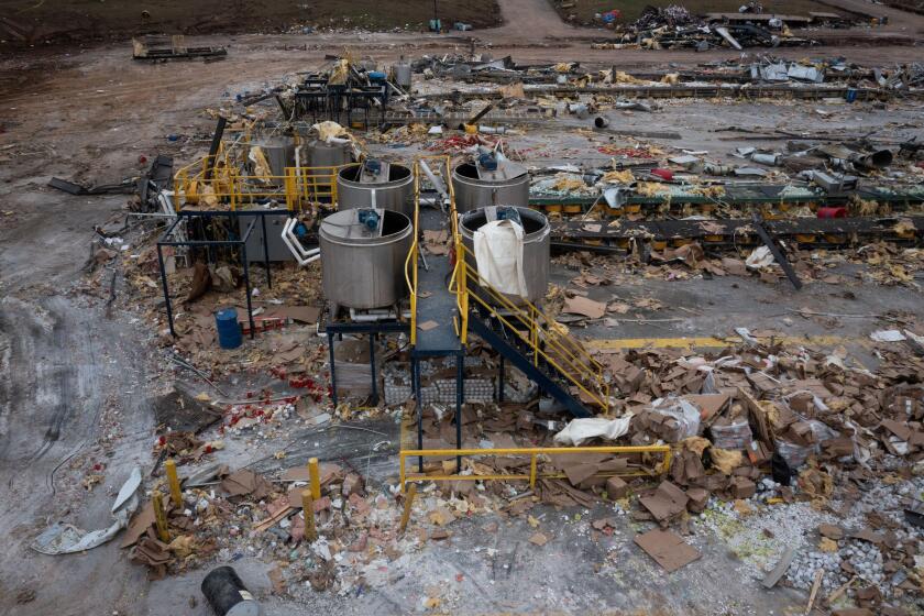 A drone picture of the Mayfield Consumer Products candle factory in the aftermath of a tornado in Mayfield, Kentucky, U.S. December 15, 2021. Picture taken with a drone. REUTERS/Adrees Latif