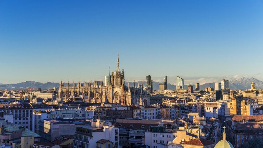 Milano, 2015 panoramic skyline with Italian Alps on Background