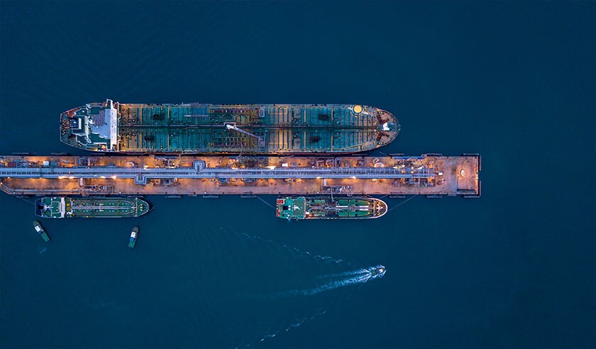 Aerial view oil ship tanker carrier oil at terminal sea port, Large crude oil tanker unloading at port marine energy.jpg