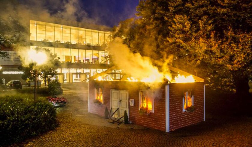 baden-baden-burning-house-greenpeace.jpg