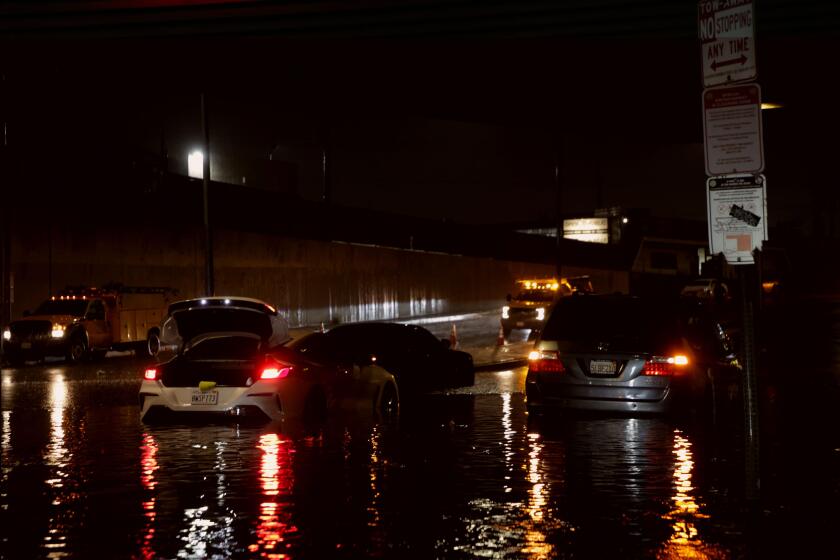 Los Angeles, United States. 20th Aug, 2023. Cars trapped in flood waters along the Sherman Way. Hurricane Hilary brings intense rain and flood warnings throughout Southern California, becoming the regions first tropical storm in decades. Credit: SOPA Imag