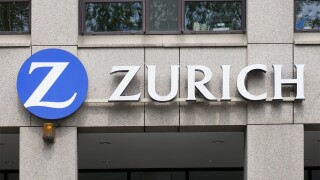 Sign of Zurich Financial Services Group on buildings facade