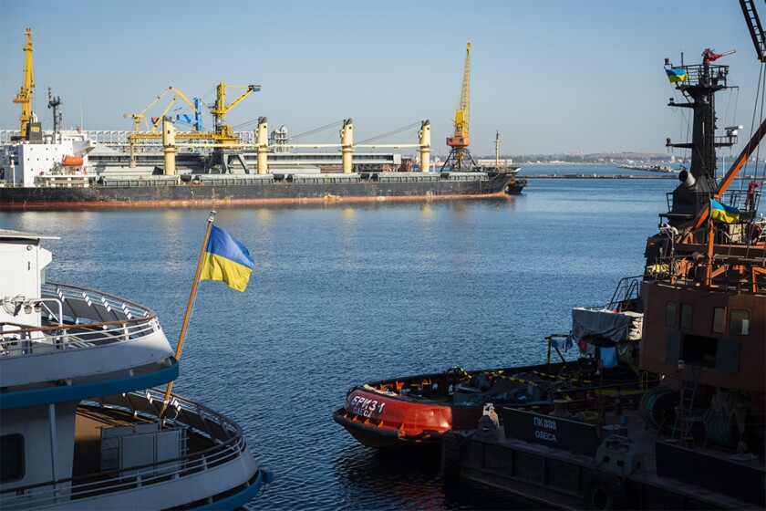 Ukrainian flag flies from the stern of a ship in the Black Sea port of Odessa, Ukraine.jpg
