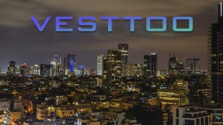 vesttoo logo israel skyline night.jpg