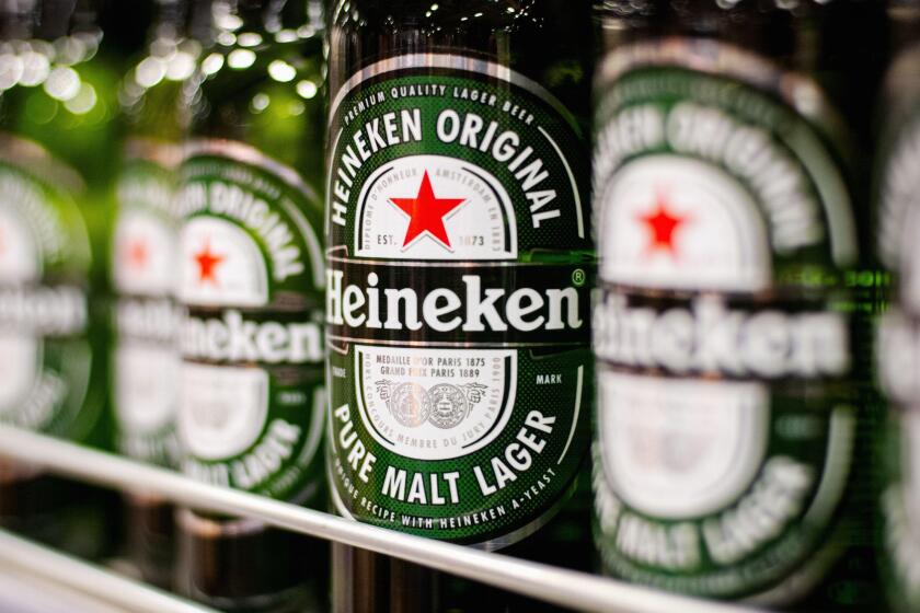 Bottles of Heineken Lager Beer on the supermarket shelf, Moscow, November 2021
