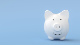 Piggy bank on blue background.jpg