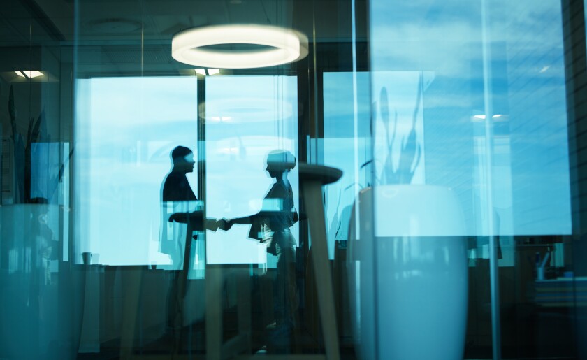 Deal Acquisition M&A handshake.jpg