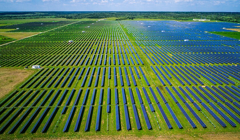 Drone view overlooking thousands of Solar Panels power homes across Central Texas .jpg