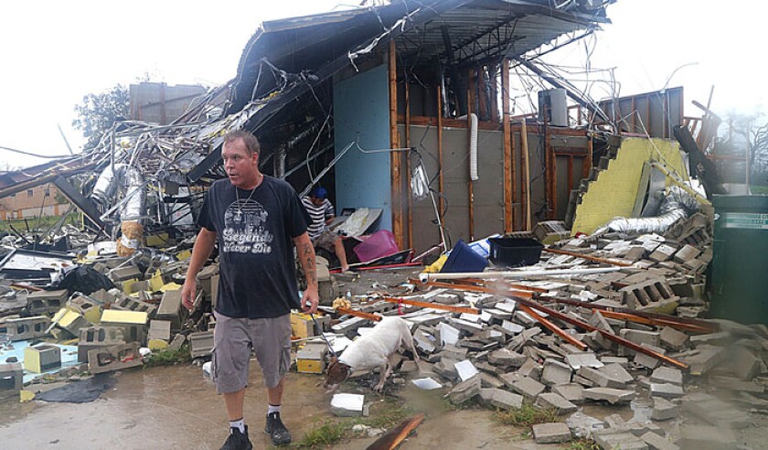 brian-bon-inspects-damages-in-the-panama-city-fl-usa-downtown-area-after-hurricane-michael-pa-39058443-web.jpg