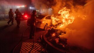 Firefighters battle the Eaton Fire Tuesday, Jan. 7, 2025 in Altadena, Calif. (AP Photo/Ethan Swope)