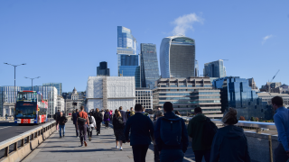 London Bridge and City of London People walk along London Bridge past The Shard.png
