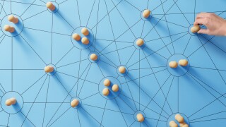 Social media networking. Network with members connected with each other. Group of people. Communication, teamwork, community, society. Abstract concept with wooden pieces on blue background.