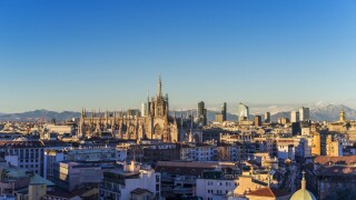 Milano, 2015 panoramic skyline with Italian Alps on Background