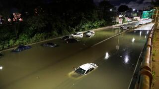 New York, USA. 2nd Sep, 2021. Vehicles are submerged on a waterlogged road in New York, the United States, Sept. 2, 2021. New York State Governor Kathy Hochul declared her first state of emergency early Thursday as remnants of Hurricane Ida brought torren