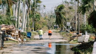 Sarasota, Florida, USA. 10th October, 2024. Residents survey damage to their neighborhood following Hurricane Milton. Credit: david childers/Alamy Live News