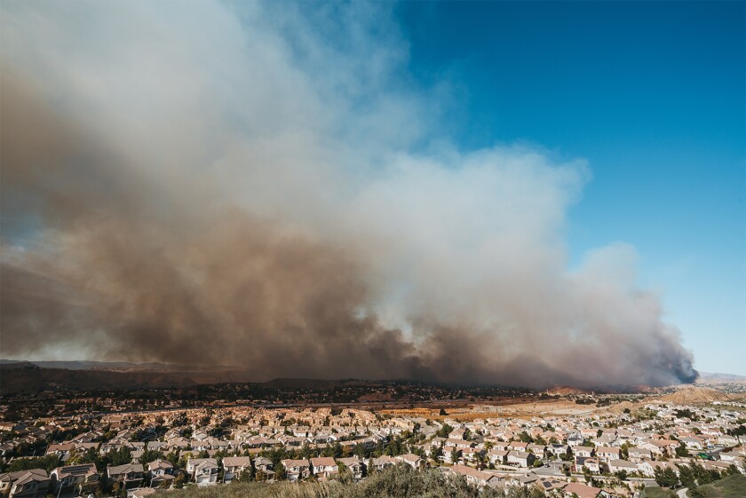 California wildfire burns near a residential area.jpg