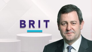 brit logo leader podium with thompson.jpg