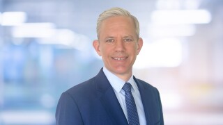 Abstract blurred inside interior of hospital building background with shine light for advertisement design and show content concept