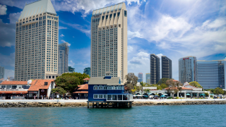 Manchester Grand Hyatt and the Marriott hotels dominate the skyline of San Diego, CA.png