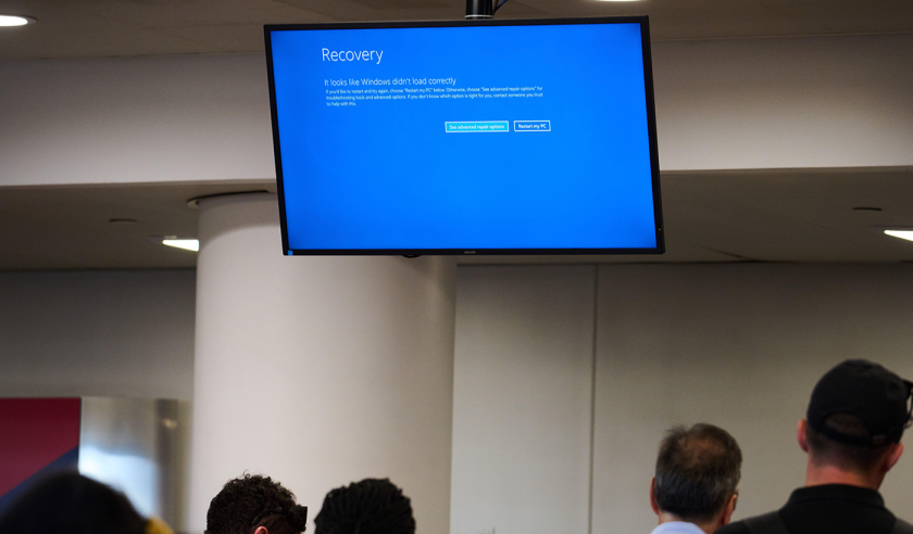ALAMY microsoft outage blue screen people july 2024.png