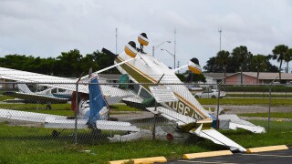 Pembroke Pines, FL, USA. 28th Sep, 2022. A general view of the aftermath as Small aircraft are seen flipped up side down after a reported tornado touches down at North Perry Airport as Hurricane Ian approaches on September 28, 2022 in Pembroke Pines Flori