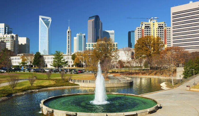 charlotte-downtown-skyscrapers-with-a-park-and-fountain-istock-469737350-web.jpg