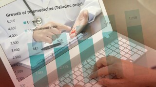 A middle-aged man who uses telemedicine to listen to a doctor for medication.
