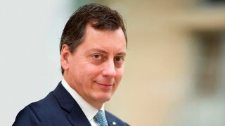John R. Dacey, membre du Comex d'Axa.