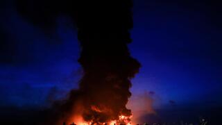 Indramayu, Indonesia. 29th Mar, 2021. Smokes and massive fire rise from an oil refinery of state-owned oil and gas company PT Pertamina at Balongan, Indramayu, West Java, Indonesia, on March 29, 2021. Three people went missing and 19 others were wounded w