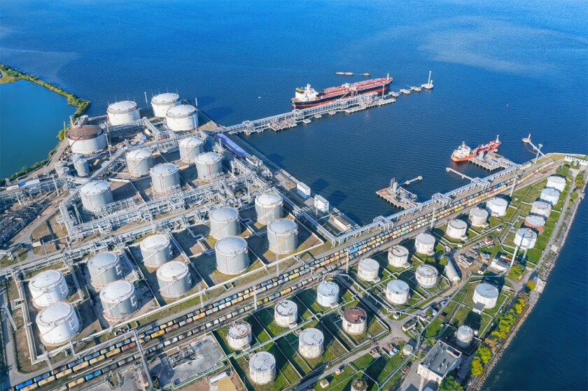 Oil terminal with a pier and a moored ship aerial view.jpg
