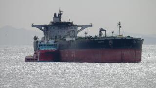 Piraeus, Greece, 17 March 2025. The Greek tanker "Sounio" is seen towed by two tugs in order to keep position in Piraeus anchorage. The tanker Sounion which drew worldwide attention in August 2024 after it was damaged by the Houthis in multiple attacks of