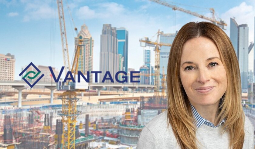 Vantage logo construction site with Heather Longo.jpg