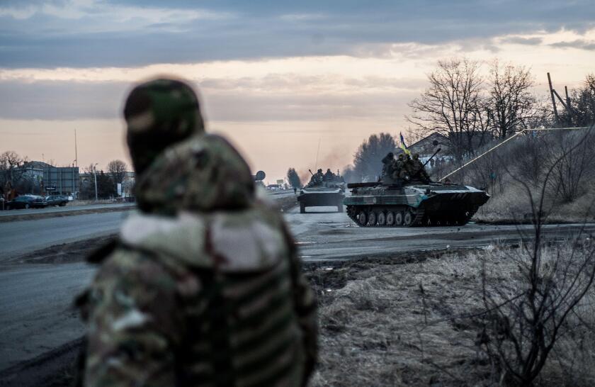 Ukrainian troops and tanks in Eastern Ukraine.