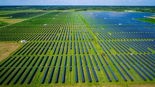 Drone view overlooking thousands of Solar Panels power homes across Central Texas .jpg