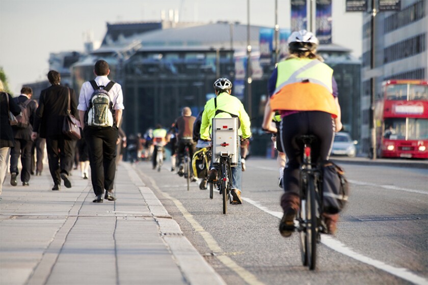 Commuters on foot and cycling over waterloo bridge.jpg